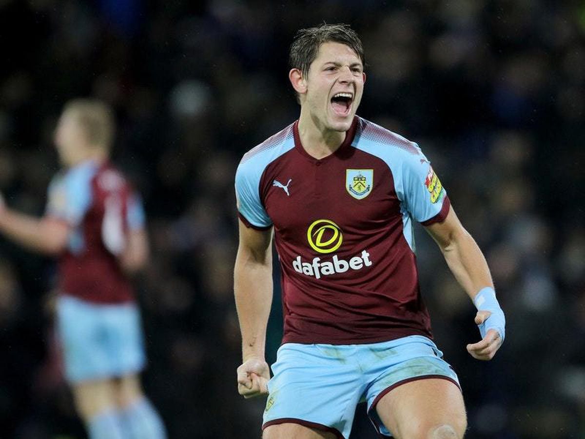  James Tarkowski of Burnley celebrates winning an aerial duel during a Premier League match.