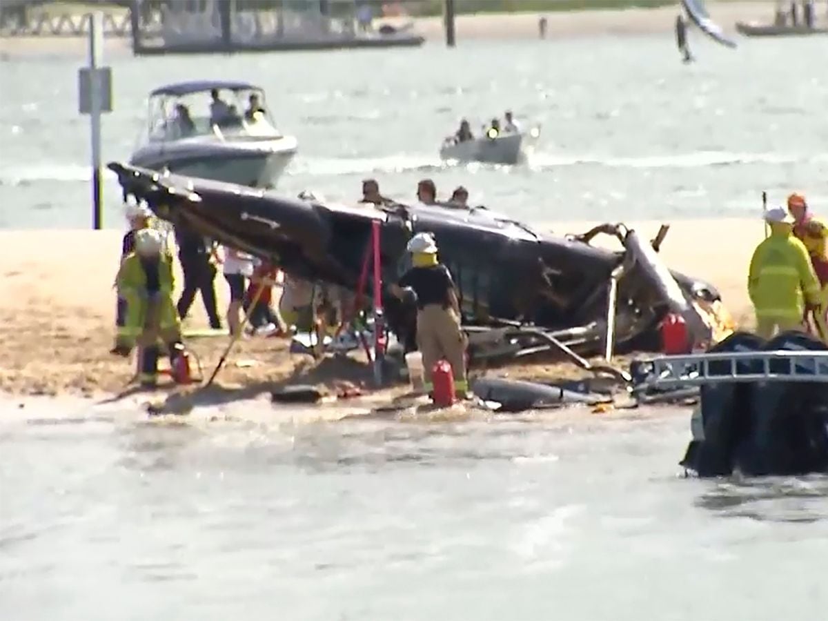 Four passengers killed as helicopters collide over Australian beach