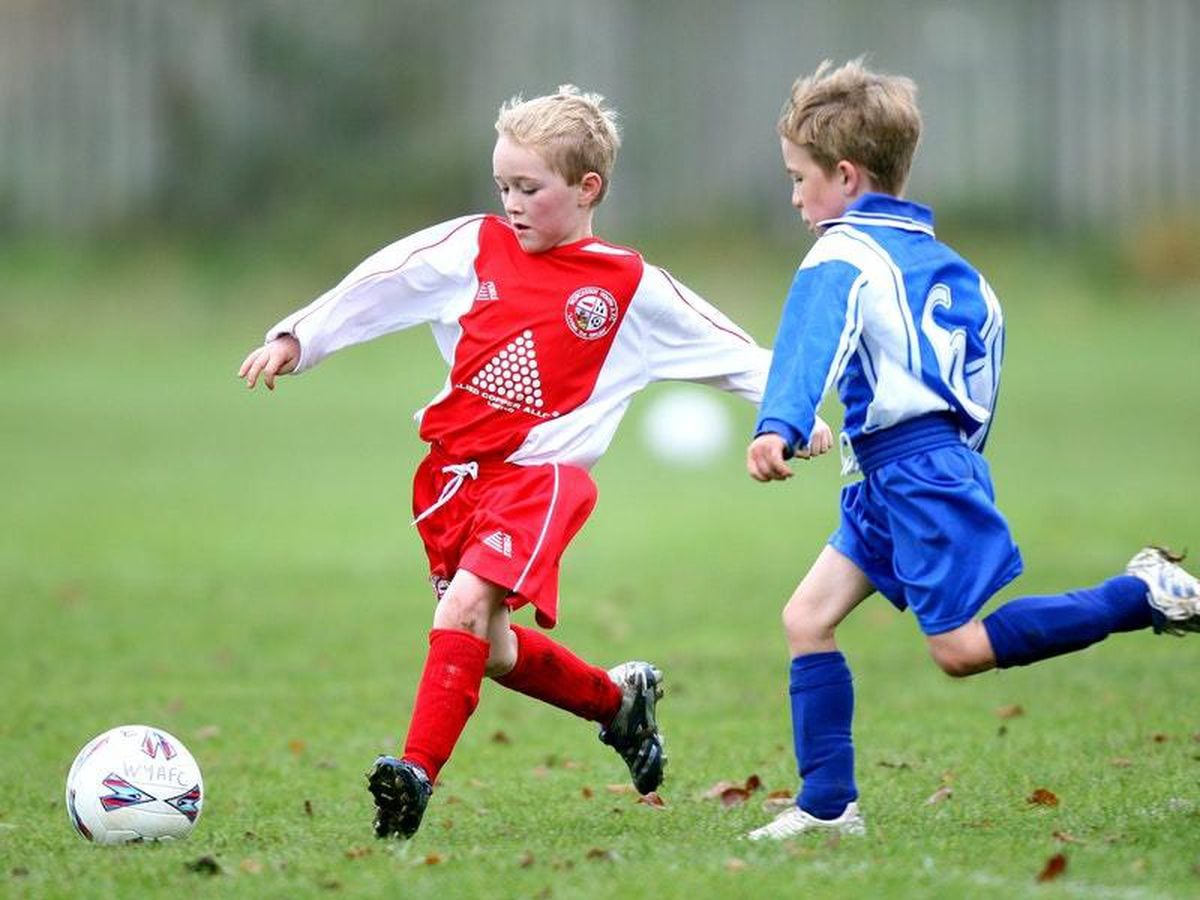 Play Football. Boy is playing Football. Football boy Player. Ball boy.