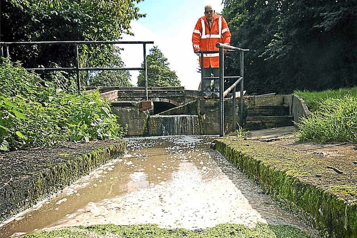 canal storm overflow newport drains polluted water manhole sign shropshire bridge shropshirestar covers