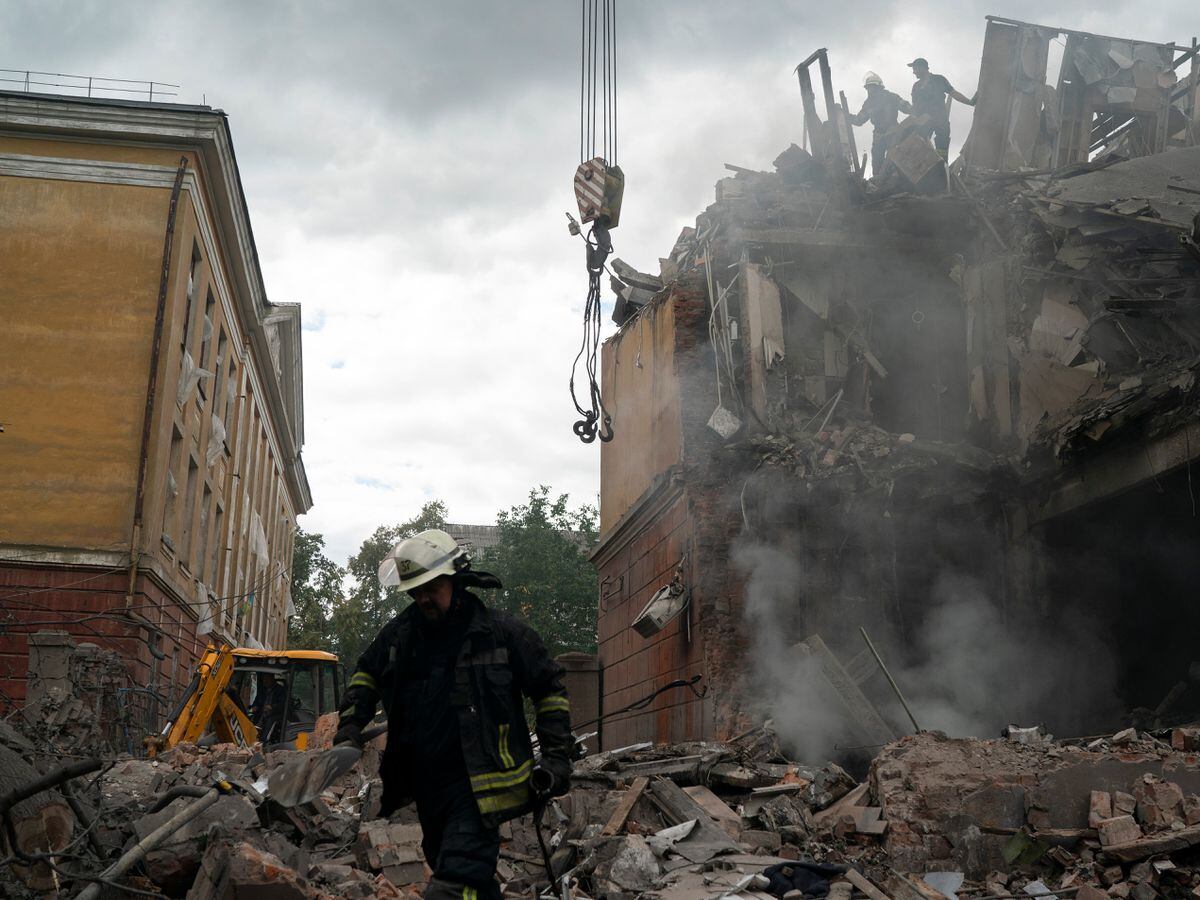 Firefighters struggle to put out blaze after Russia attack in Sloviansk, Ukraine