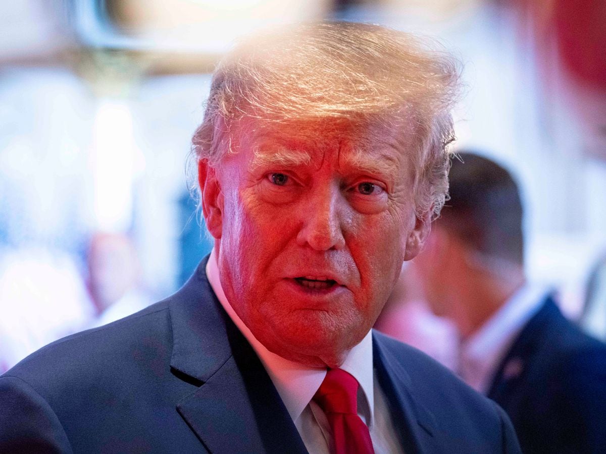 Former President Donald Trump addresses members of the media at Mar-a-Lago