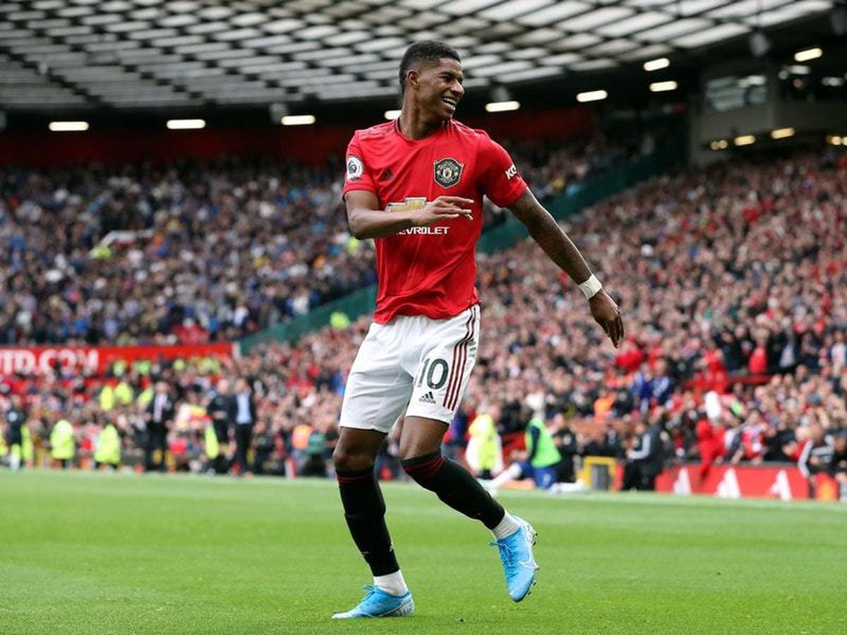  Marcus Rashford, a Manchester United and England player, celebrates scoring a goal during a 2019 Premier League match.