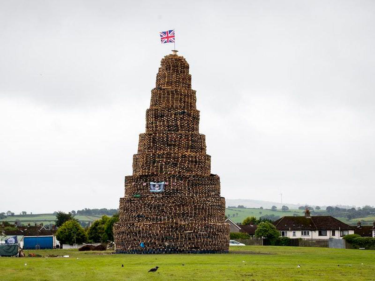 Why are huge bonfires lit across Northern Ireland on Eleventh Night