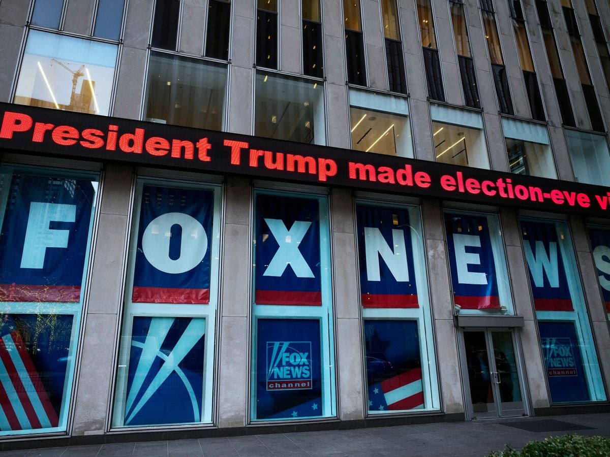 A headline about President Donald Trump is displayed outside Fox News studios in New York