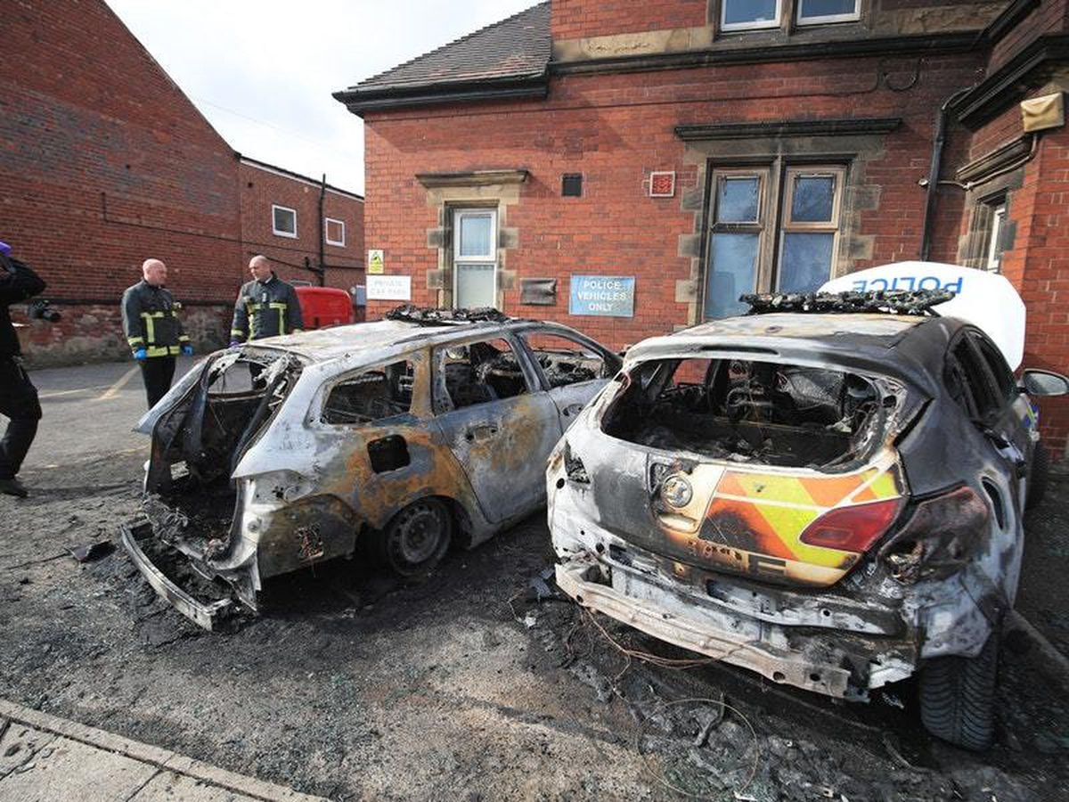 Two Patrol Cars Wrecked In Arson Attack Outside Police Station ...