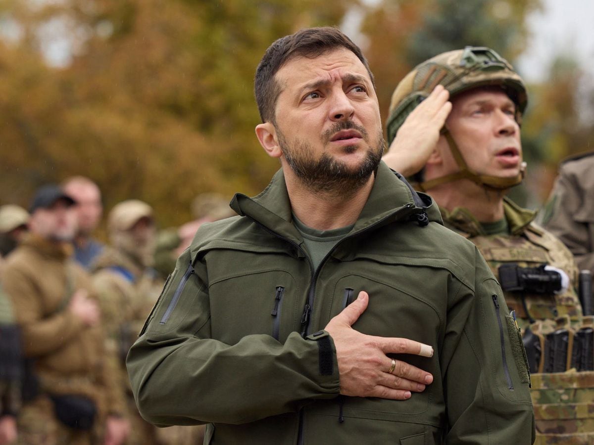 Zelensky sings with hands on heart