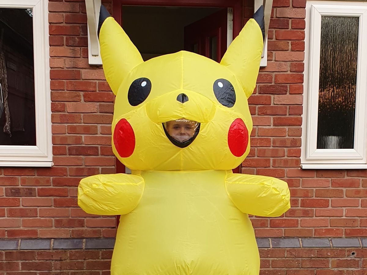 A Person Dressed In An Inflatable Pikachu Costume To Entertain