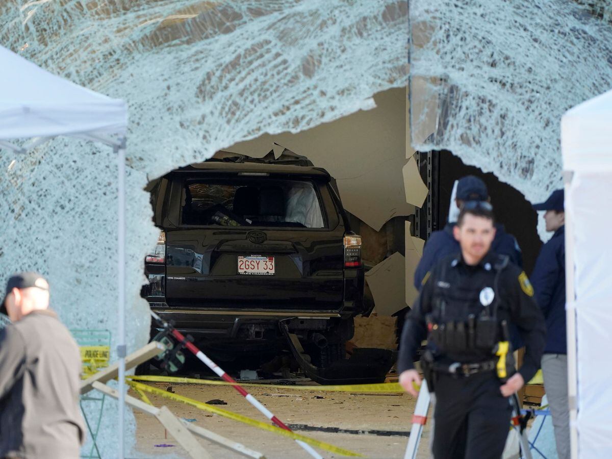 The SUV inside the Apple store after the crash