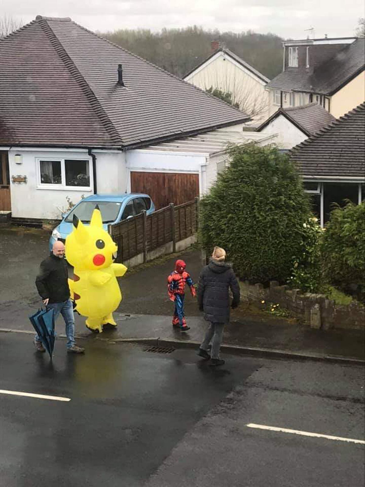 A Person Dressed In An Inflatable Pikachu Costume To Entertain