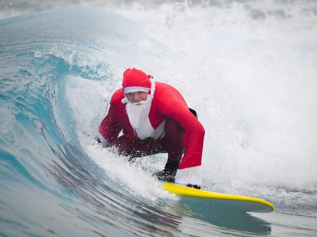 Surfing Santa hits the waves | Shropshire Star