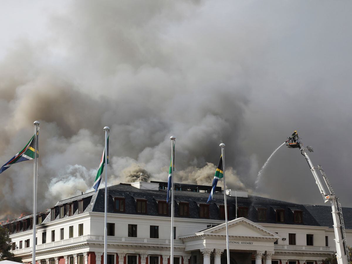 Smoke rises from the parliament in Cape Town, South Africa, in January 2022