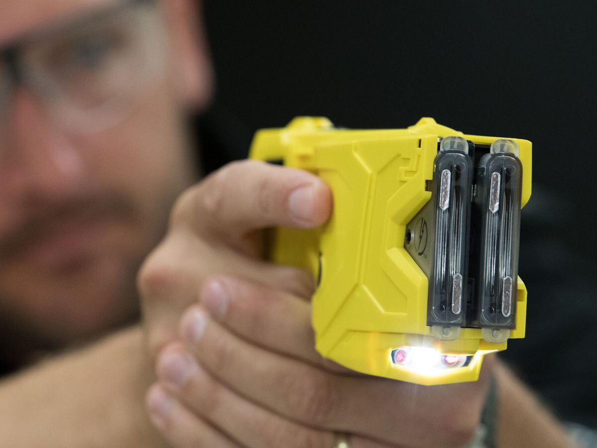 Police Use Taser As Trouble Flares During Christmas Day Violence In