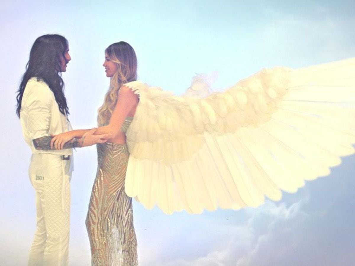 Abbey Clancy appears as harp-playing angel in The Darkness music video |  Shropshire Star