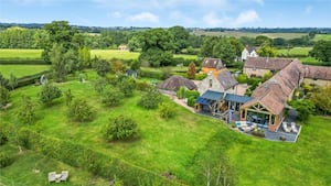 Barn with separate annex, paddock and stables listed for sale under £1 million