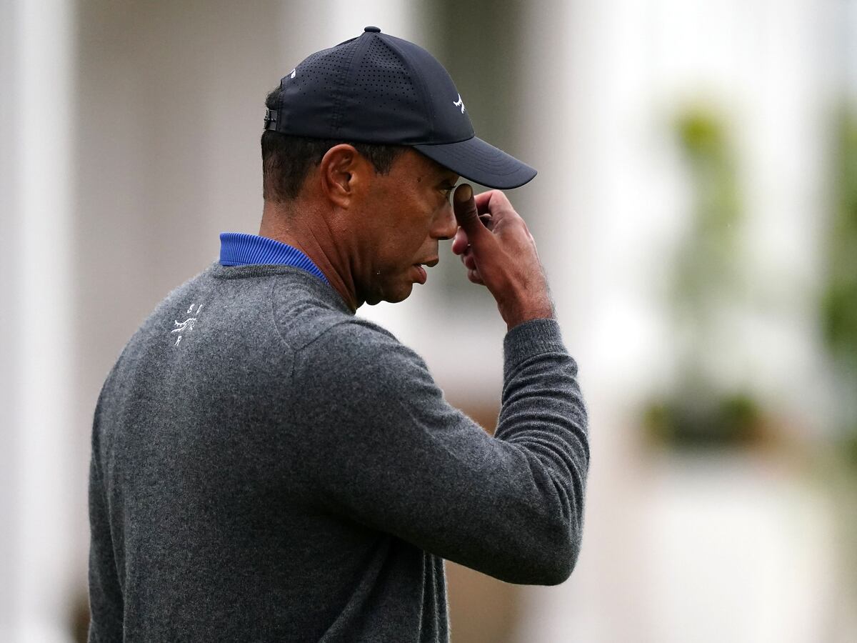 Tiger Woods cuts frustrated figure after 79 leaves him fighting to make Open cut