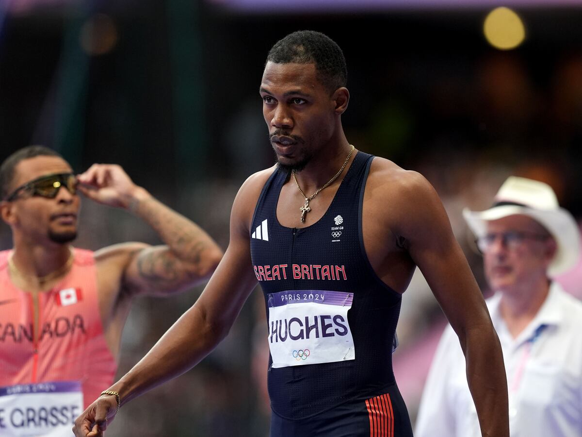 Zharnel Hughes withdraws from 200m heats with ‘hamstring tightness’