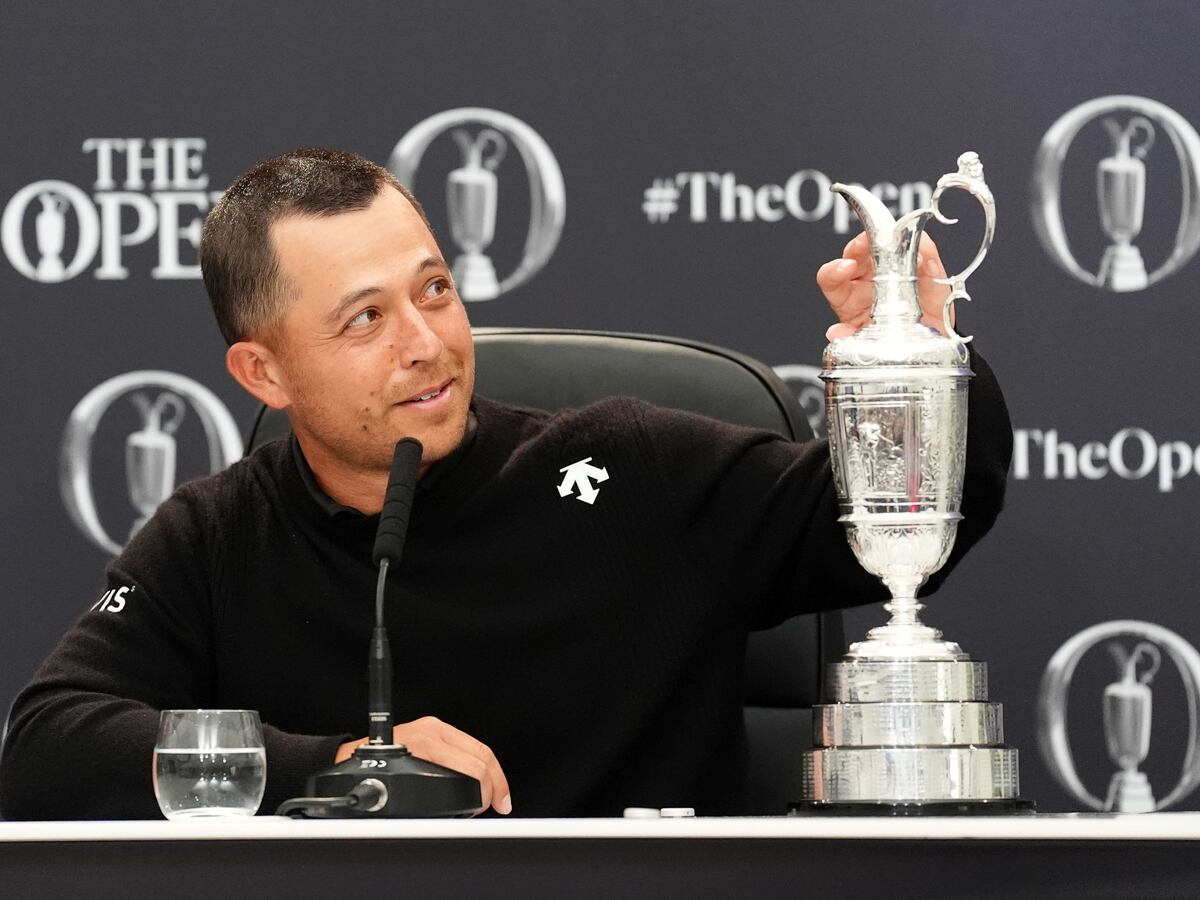 The Open: Xander Schauffele lets father Stefan take first drink from Claret Jug