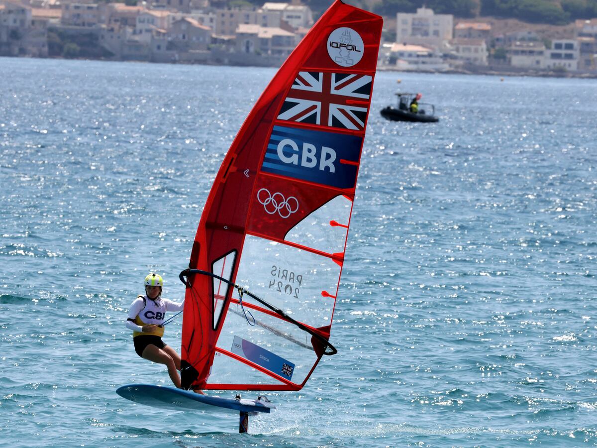 Windsurfer Emma Wilson guaranteed a medal for Great Britain after weather delays