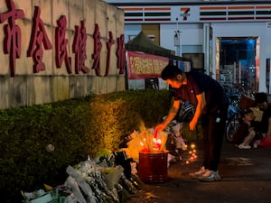 Tributes outside the Zhuhai People’s Fitness Plaza after the crash (Ng Han Guan/AP)