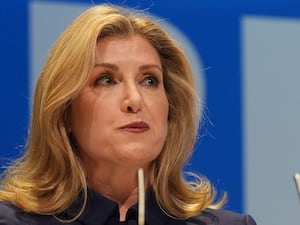 Penny Mordaunt speaking during the Conservative Party Conference at International Convention Centre in Birmingham