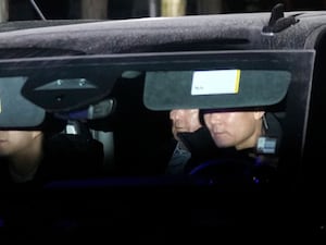 A vehicle carrying impeached South Korean President Yoon Suk Yeol leaves for Seoul Detention Centre