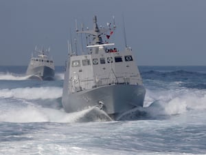 Two Kuang Hua VI-class missile boats are seen during a simulated attack drill off Kaohsiung City, southern Taiwan