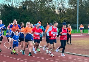 Members of the Shropshire Shufflers running alongside Kevin Sinfield