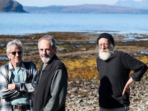 Local activists Rick Rhode, Peter Carra and Mick Simpson in the hamlet of Arnisdale on the banks of Loch Hourn, Scotland