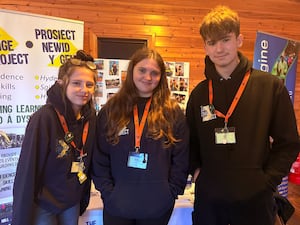 Game Change Project volunteers Millie, Maia, and George (left to right)