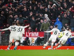 Manchester United’s Lisandro Martinez celebrates scoring against Liverpool at Anfield