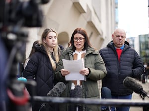 From left, Casey Hoath, Kerrie Hoath and Jason Hoath speaking outside the Old Bailey, London