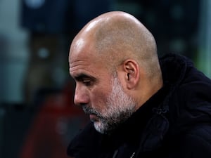 Manchester City manager Pep Guardiola looks dejected