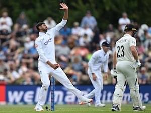 England’s Shoaib Bashir bowls during play on the first day of the first Test between England and New Zealand at Hagley Oval in Christchurch