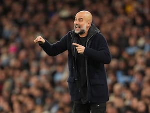 Manchester City manager Pep Guardiola gestures on the touchline (Martin Rickett/PA)