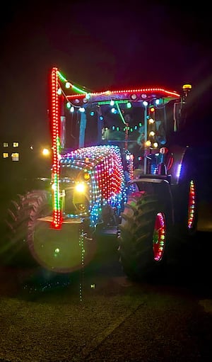 Carl Richards' prize-winning tractor covered in bright Christmas lights.