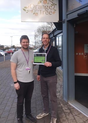 Telford College catering tutors Rob Lee and Andy Minchin celebrate the five-star rating for The Orange Tree.