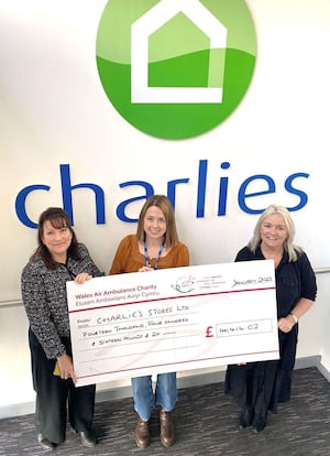 Director of Income Generation for the Wales Air Ambulance, Phae Jones (left), Charlies Stores Managing Director Rebecca Lloyd (middle), Regional Fundraising Manager, Kate Thomas (right) with cheque for the Air Ambulance