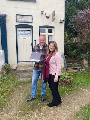 Bucknell postmaster Klaus Steffes with Post Office Area Manager Jennifer Pougunas