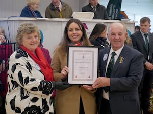 Sioned Davies was presented with the Nuffield Scholarship by Show President Denley Jenkins and his wife, Brenda. (Image: Andy Compton)