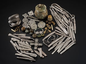 The Galloway Hoard spread out on a black background