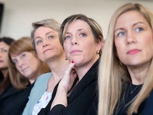 Head shots of five women