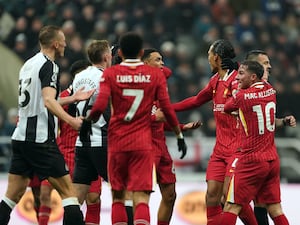 Liverpool players appeal for a penalty