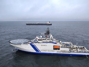 A Finnish Border Guard ship near the oil tanker Eagle S