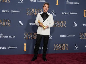 Colin Farrell with his Golden Globe award