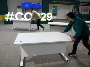 Desks are moved at the Cop29 UN Climate Summit