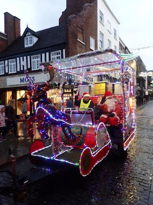 Santa and elf on the sleigh in a run through Shrewsbury town centre.