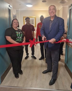 Andy Munro, mayor of Church Stretton reopens the refurbished dementia unit at Stretton Hall after flood damage