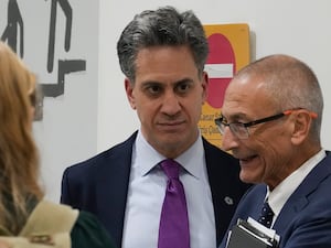 Ed Miliband (centre) speaks with US climate envoy John Podesta (right) at the Cop29 summit in Azerbaijan