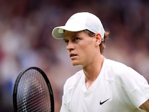 Jannik Sinner in action at Wimbledon